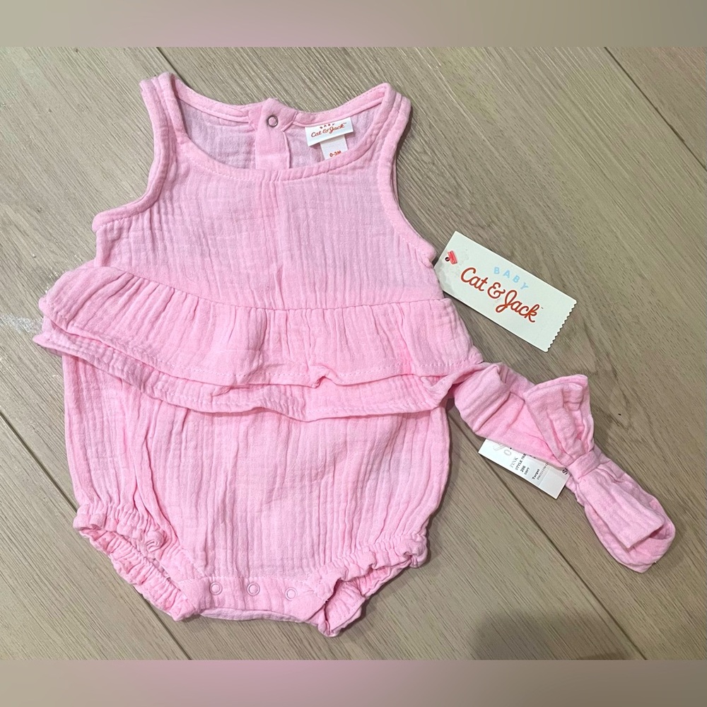 NWT.  Cat & Jack Baby Pink Romper. Size 0-3 mos.